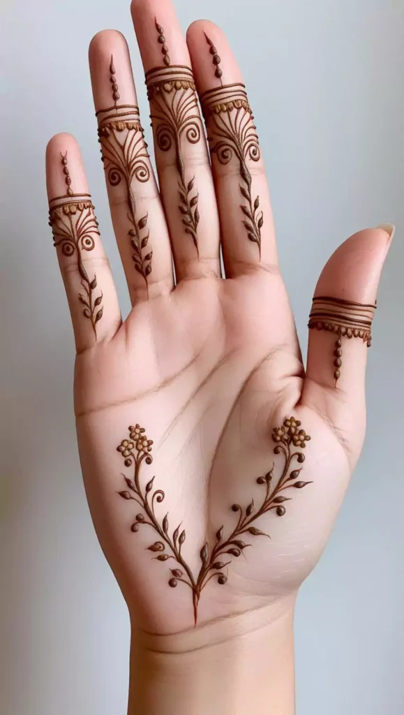 Geometric front-hand mehndi with complex patterns and fine detailing